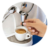 Adjustable coffee dispensing spout can accomodate different cup sizes